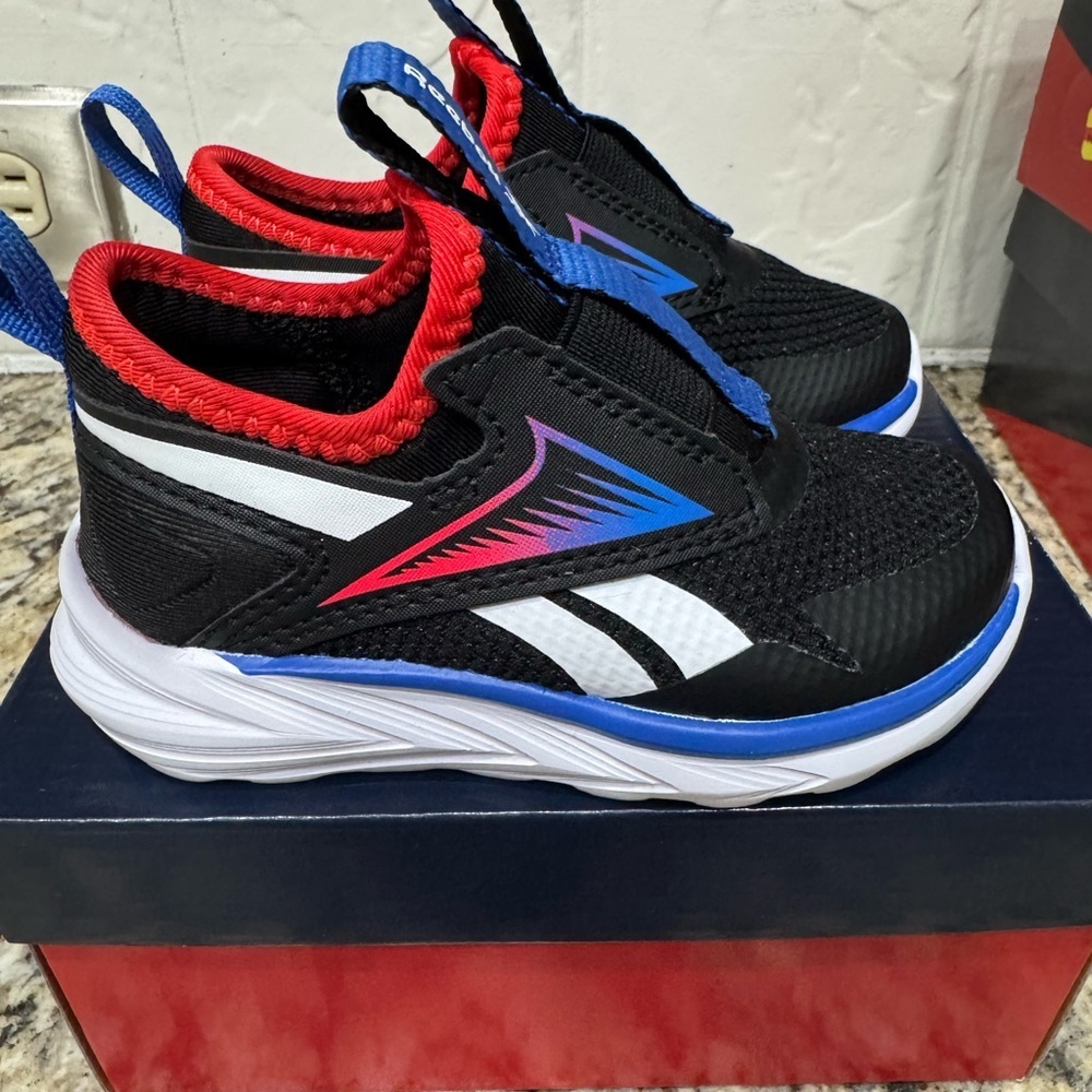 NWT Reebok Kids shoes Black Sneakers with Blue and Red Highlights size 6